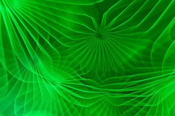 Abstract green lit vivid pattern, photograph created with slow shutter speed and camera rotation