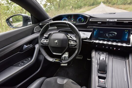 Peugeot 508 PSE. Sporty tuned car with plug-in hybrid drive. Cabin interior - dashboard. 08-31-2022, Middle Bohemia, Czech Republic.