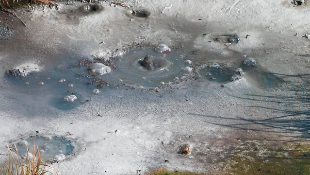 Semi-thermal area, geothermal fluid. Mineral hot springs is confined to post-volcanic phase, white ammonium chloride. Kamchatka
