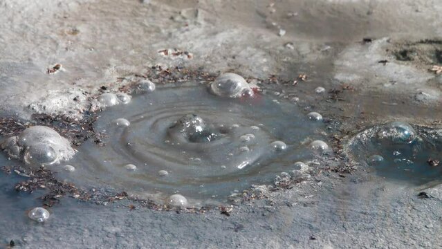 Semi-thermal area, geothermal fluid. Mineral hot springs is confined to post-volcanic phase, white ammonium chloride. Kamchatka