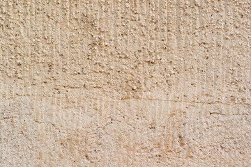 Old wall grange background texture, vintage surface, for design decoration. Old beige concrete wall.