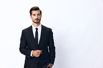 Obraz na płótnie Canvas Portrait of a man in an expensive business suit on a white background isolated, copy space. Businessman startup technology
