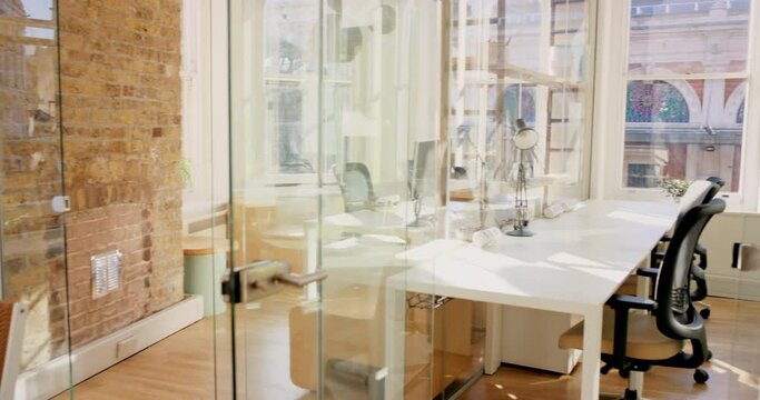 Empty office, coworking interior and creative startup in marketing agency with furniture, chairs and tables. Modern workspace, business building and open room in property, architecture and workplace