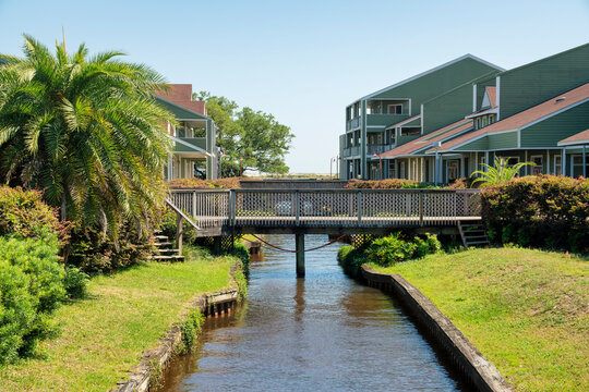 Destin, Florida- Small business plaza near the beach with bridges over the creek in the middle