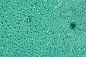 Water drops on mint background
