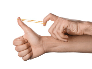 Man with yellow rubber band on white background
