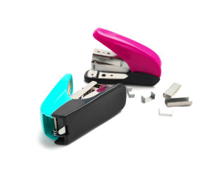 Office staplers with staples isolated on white background