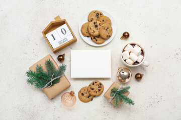Calendar with text 10 DAYS UNTIL HOLIDAYS, blank card, cookies, cup of cocoa, Christmas gifts and...