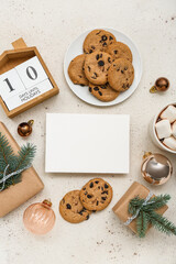 Calendar with text 10 DAYS UNTIL HOLIDAYS, blank card, cookies, cup of cocoa, Christmas gifts and decor on white background