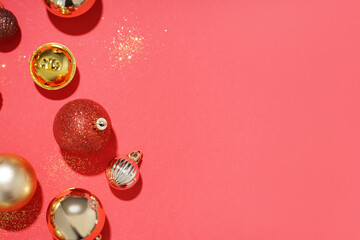 Shiny Christmas balls on red background
