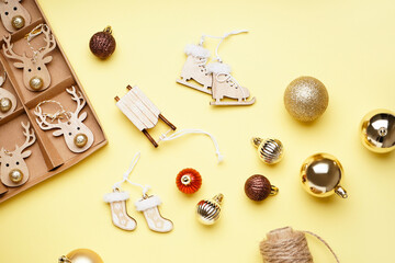 Beautiful Christmas toys on yellow background