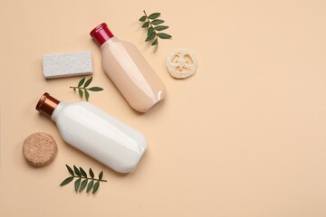 Obraz na płótnie Canvas Flat lay composition with solid shampoo bar and bottles of cosmetic product on beige background, space for text