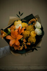 A bright bouquet of flowers in an autumn design