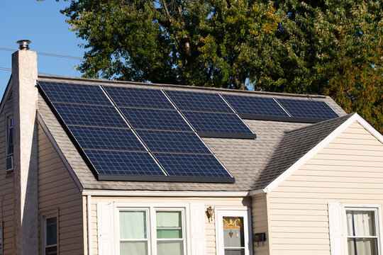 Solar photovoltaic panels on a house roof