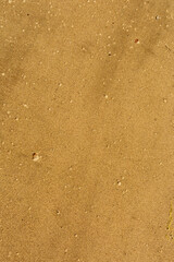 yellow sand on the beach close up