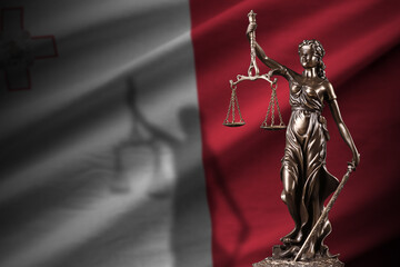 Malta flag with statue of lady justice and judicial scales in dark room. Concept of judgement and...