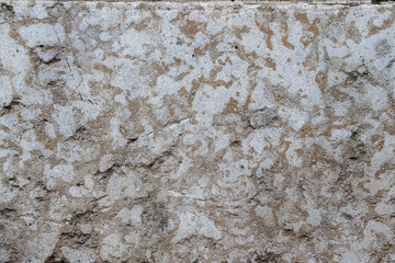 Stone texture. Weathered rough surface of old rock. Decorative stone with natural patterns. Great for background and design