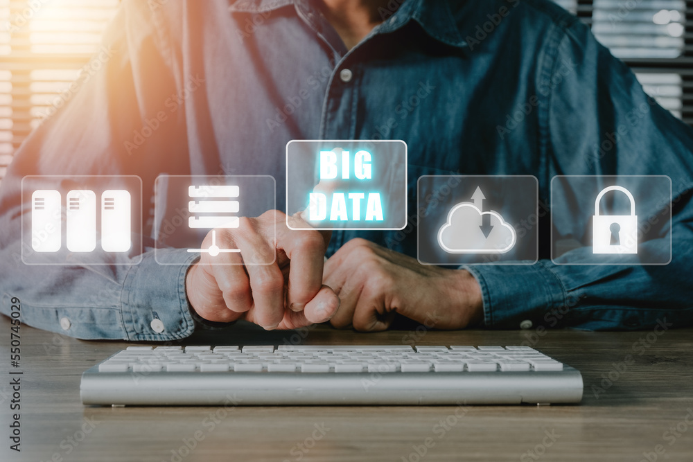 Poster big data concept, person using laptop and smartphone with big data icon on vr screen on office desk.