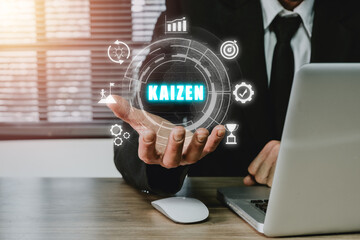 KAIZEN concept, Businessman hand holding kaizen icon on virtual screen, Business philosophy and...