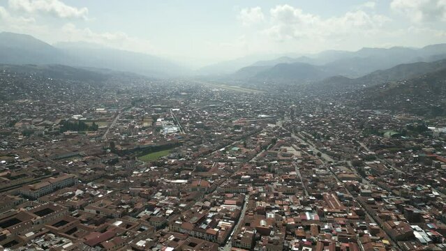 Aerial of cusco cityscape of Peru drone fly above famous city for machu picchu Inca trail sacred valley