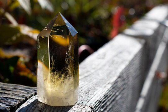 A close up image of a citrine crystal healing tower used in reiki practices and attractive abundance. 