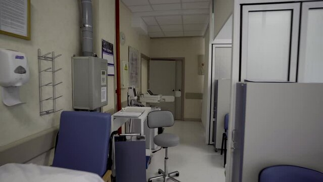 walking in a empty clinic with empty white room private hospital doctor POV 