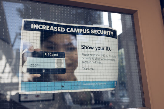 View of sign Increased Campus Security at one of the building at University of British Columbia