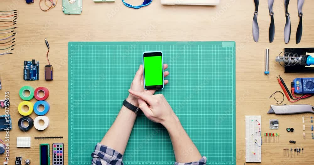 Aufkleber technician, hands and scroll on green screen phone with tools on desk for engineering, computer or h