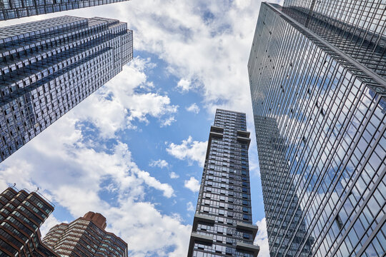 Tall skyscrapers plus office buildings from a low angle in New York City, USA