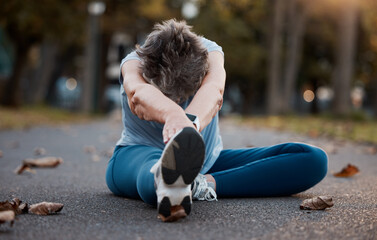 Fitness, senior and woman stretching legs outdoors for wellness, flexibility and mobility. Health,...