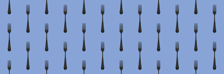 pattern. Fork top view on pastel blue background. Template for applying to surface. Banner for insertion into site. Flat lay. 3D image. 3D rendering.