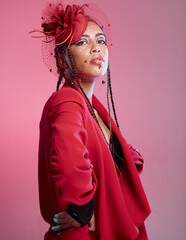 Woman, red fashion and edgy portrait, trendy and vintage wear in studio. Punk model, funky rock...