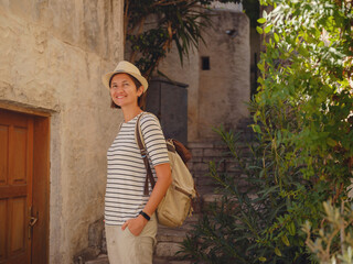 Marmaris is resort town on Turkish Riviera, also known as Turquoise Coast. Marmaris is great place for sailing and diving. Tourist Woman on Beautiful Streets of old Marmaris.