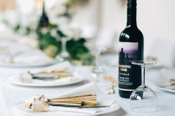 wedding table with wine and glasses