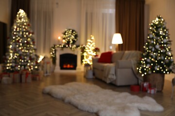 Blurred view of living room with Christmas decorations. Interior design