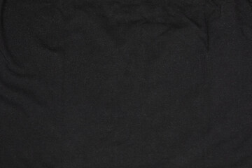 Black dark canvas fabric cotton background with folds copy space
