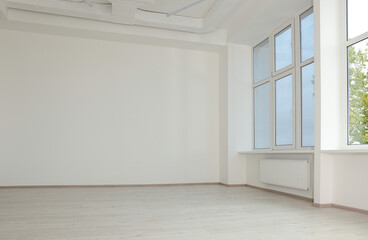 New empty room with clean windows and white walls