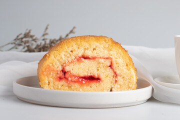 Strawberry Roll Cake on white background