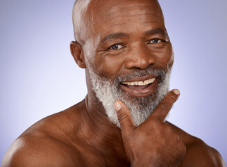 Portrait, skincare and black man with beard, wellness and natural beauty on studio background. Cosmetics, happy senior gentleman and African American male with organic facial, smooth and clear skin.