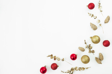 Christmas holidays composition with golden and tree decoration on white background. Flat lay, top view.