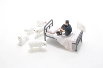 Fotobehang a mini figure, the Sleepless counting sheep © solution