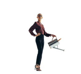 Portrait of a confident business woman pouring water out of a water can on a transparent background