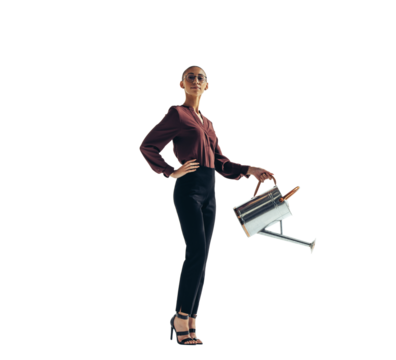 Portrait of a confident business woman pouring water out of a water can on a transparent background - Powered by Adobe