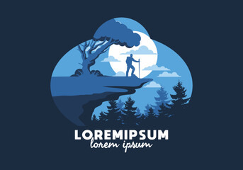 Mountain climbers standing on the edge of a cliff under a shady tree