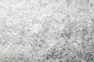 White snowflakes in winter as a background.