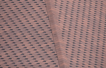 New shingles on the roof of the house