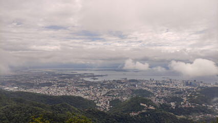 An aerial view of Rio de Janeiro shrouded in fog. Seen from the helipad area of Mirante Dona Marta, Rio de Janeiro, Brazil
