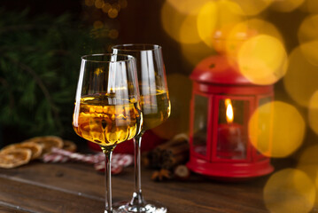 White wine in glasses on a wooden table