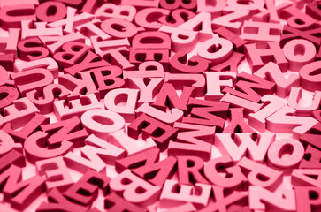 Abstract black and white background of wooden letters of the Latin alphabet. Concept: back to...