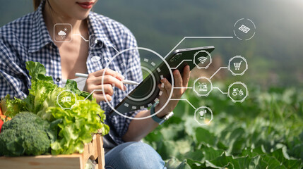 Agriculture technology farmer woman holding tablet or tablet technology to research about...